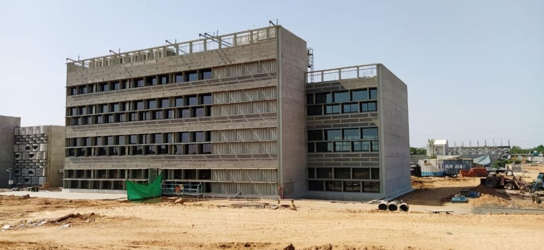 Raksha Shakti University, Tata Structura tubes, advanced campus construction, composite construction, structural steel, architectural prowess, seismic resilience, fire-resistant, aesthetic design, rapid installation, sustainability, multi-storey building, educational facilities, structural stability, efficient construction, innovative materials