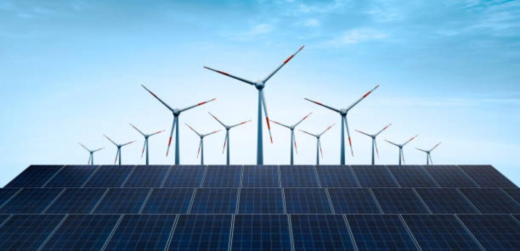 Solar energy panel photovoltaic cell and wind turbine farm power generation JSW Energy, SECI, 230 MW Contract, Renewable Energy, JSW Neo Energy Ltd, T Interstate Transmission System (ISTS), Hybrid Energy, Clean Energy,Sustainable Energy Future, India Energy Transition