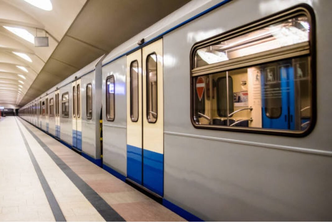 Subway train stopped at the station without people Metro Railway, Kolkata Line-4, Yellow Line extension, No Objection Certificate (NOC), civil construction, metro tunnel, RCC box-pushing method, underground extension.