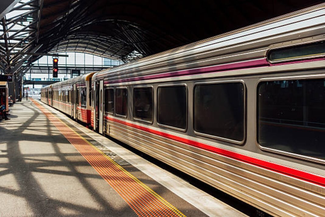 A regional Diesel powered train waiting at its terminal for departure. Hyderabad Metro Rail Phase 2, RGIA to Fourth City, Airport Metro Corridor, Revised Metro Alignment, NH-44 High Court Campus, Hyderabad Airport Metro Limited (HAML), Metro Expansion Corridors, Outer Ring Road (ORR)