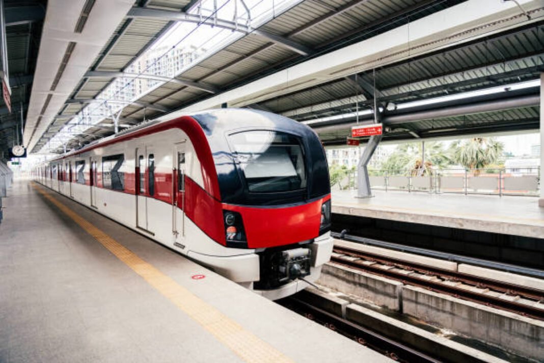 Red line sky train is running in downtown of Bangkok, Thailand Chennai Metro, Phase 2, underground stations, connectivity, economic growth, sustainable transit, public transportation, Chennai Metro Rail Limited (CMRL), 2026 completion.