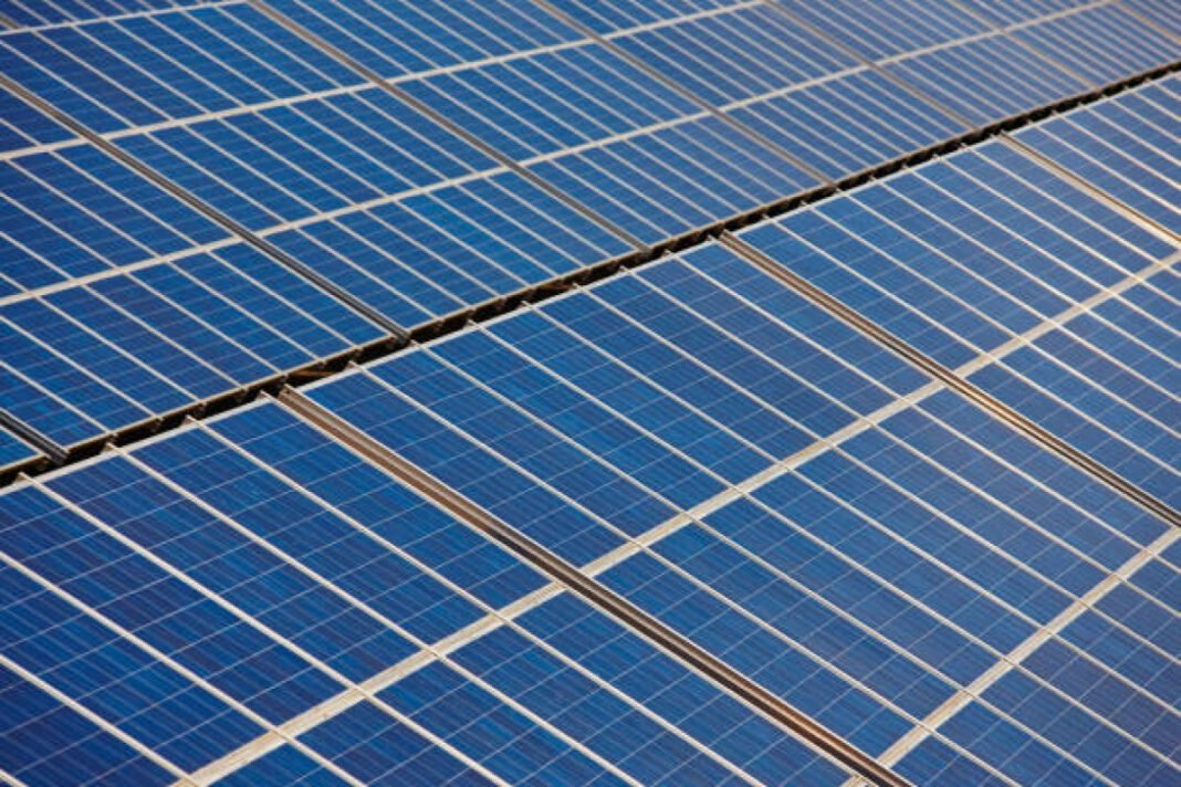 Solar panel plant. Sustainable renewable power energy and global warning India Renewable Energy, Solar Power, Offshore Wind Energy, Green Hydrogen, ALMM (Approved List of Models and Manufacturers), Viability Gap Funding (VGF), Offshore Wind Capacity, Green Hydrogen Transport, Electrolyser Capacity, GAIL, IOCL, Carbon Emissions Reduction, Sustainable Growth, Nuclear Power Expansion, Solar Capacity Increase