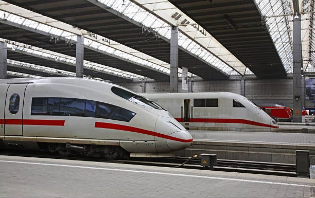 Railway station in Munich. Germany BEML, bullet train, India, Rs 8.67 billion, high-speed rail, Integral Coach Factory, ICF, design, manufacturing, commissioning, Mumbai-Ahmedabad route, rail technology, transportation infrastructure.