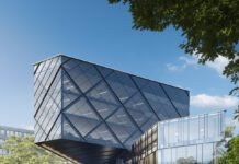 Cantilevered Diagrid: A Hybrid Steel and RCC Marvel in Kinshasa Steel-RCC hybrid system, Diagrid structure, Cantilevered high-rise, Structural engineering, Hybrid construction design, Kinshasa building project, Architectural engineering, Engineering innovation, High-rise architecture, Roark Consulting Engineers