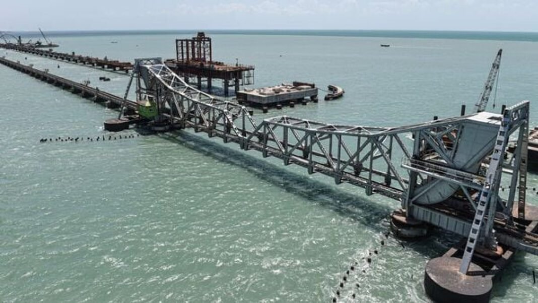 Indian Railways Nears Completion of Pamban Bridge Indian Railways, Pamban Bridge, commissioning, OMS engine test, infrastructure, rail network, southern India, rail connectivity, tourism, Rameswaram, freight movement, economic development.