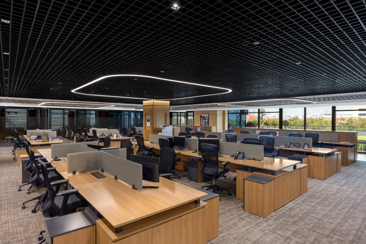 Steel exoskeleton, sustainable architecture, innovative design, modern workspace, Noida corporate office, 42mm Architecture, structural engineering, advanced construction, green terraces, architectural innovation, APL Apollo. 