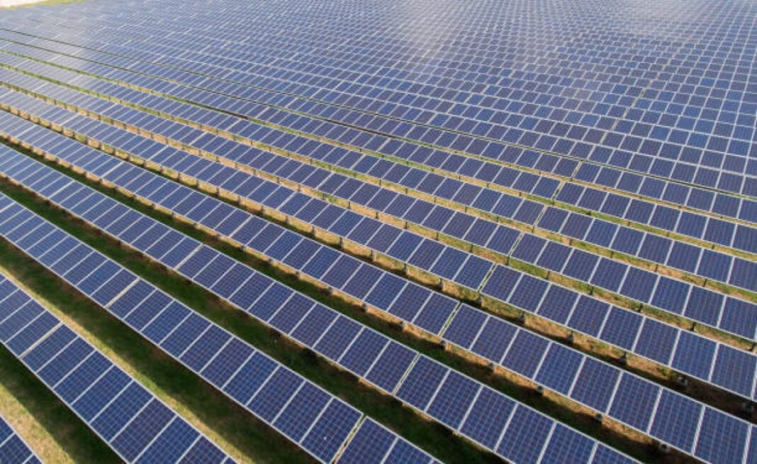 Rows of Solar panels in Solar Farm NTPC REL, Balance of System (BoS), solar modules, Module Mounting Structures (MMS), industrial projects, ISTS-connected solar project, renewable energy