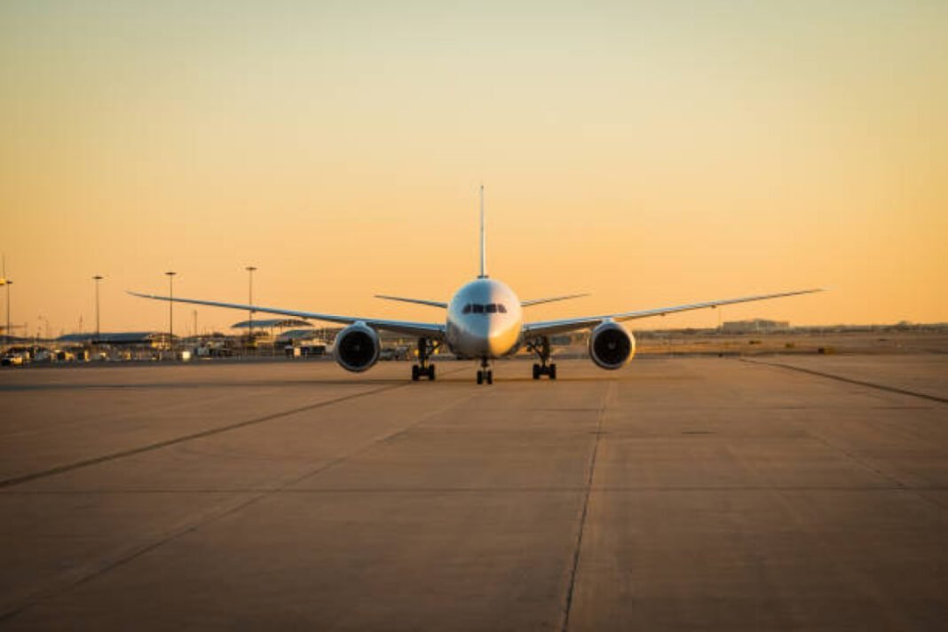 Taking off plane SVPI Airport, Adani, NECA 2024, energy efficiency, sustainability, energy conservation, renewable energy, sustainable transportation, Adani Enterprises, green initiatives