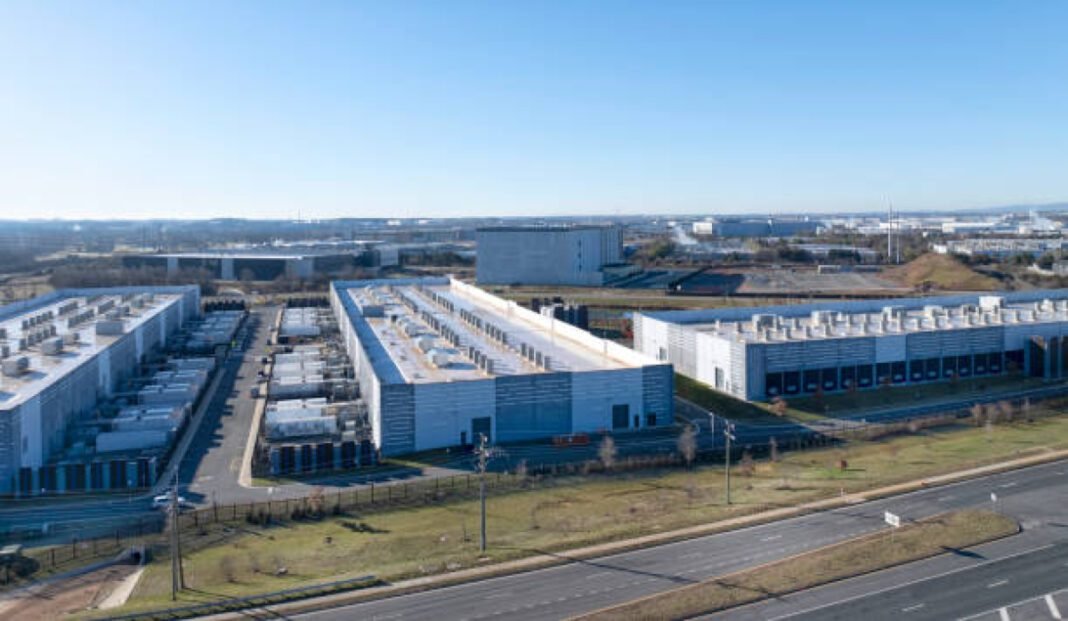 Aerial view of a data center in Ashburn, Virginia : CtrlS Datacentres, Hyderabad data centre, Chandanvelly Industrial Park, 600MW data park, AI-ready data centres, advanced cooling systems, Telangana tech hub, disaster recovery services, IT infrastructure, data-driven growth.