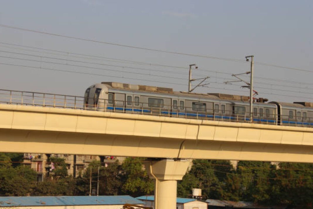 A picture of indian metro train with selective focus Agra Metro, UPMRC, metro expansion, Mankameshwar, Sikandra, Uttar Pradesh government, public transport, urban development