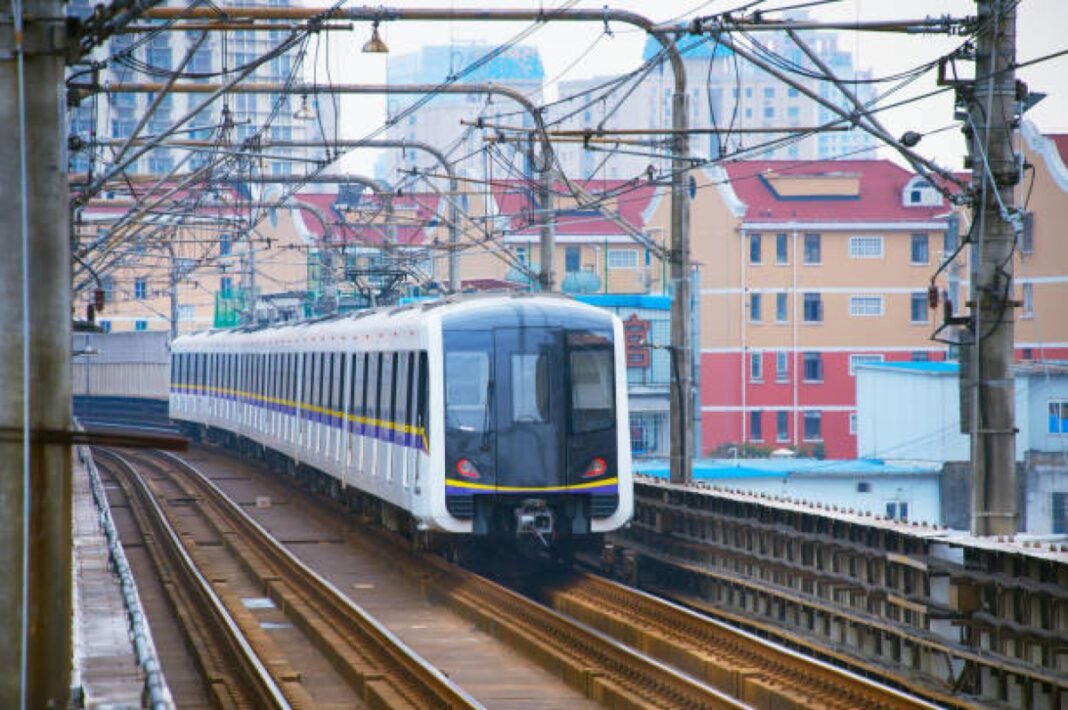 Subway train arriving to the station, Shanghai, China Vijayawada Metro, APMRC, PNBS corridors, Gannavaram, Penamalur, metro rail project, Krishna district, NTR district, infrastructure development, Vijayawada Railway Station, Benz Circle, Kesarpalli depot